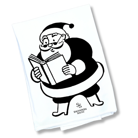Black and white illustration of a Santa Claus reading a book with 'Salvation South' logo on a white background.